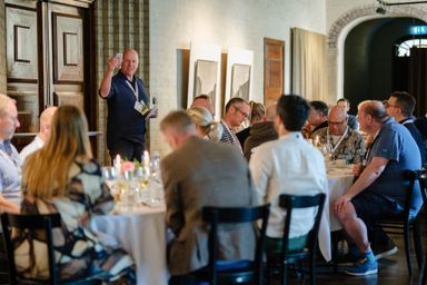 CEO Jimmy Nilsson raising a toast during the myConf 2024 dinner.